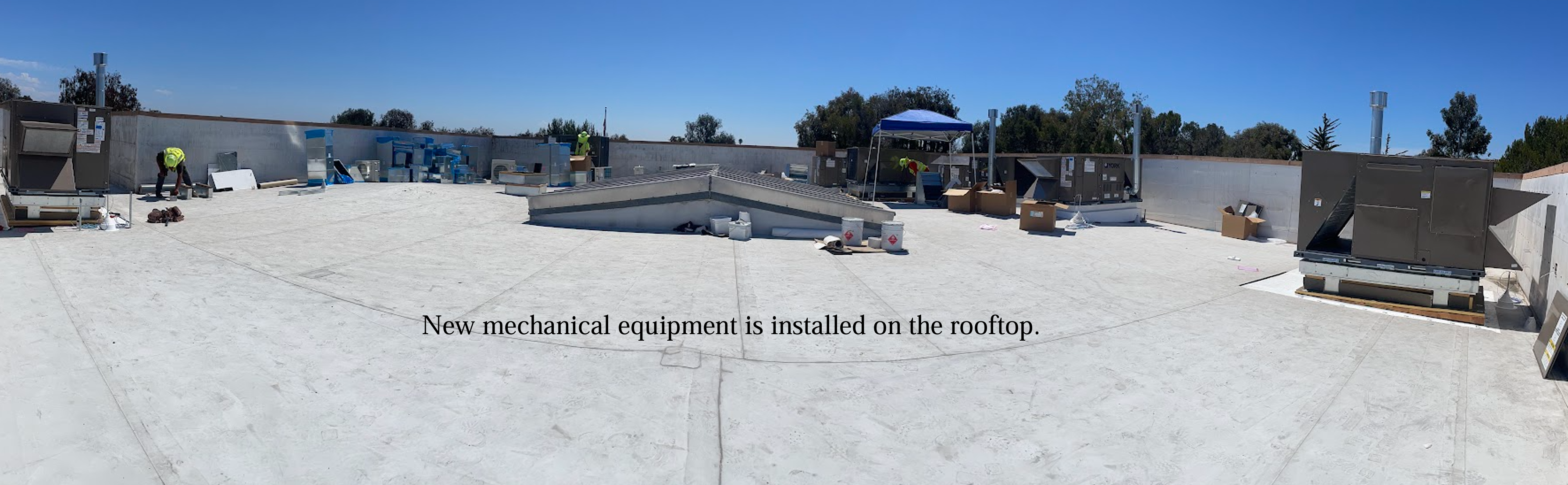 New mechanical equipment is installed on the rooftop.