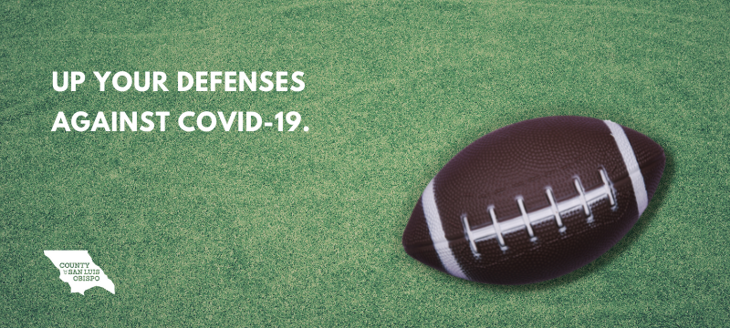 Photo of football with text, "Up Your Defenses Against COVID-19"